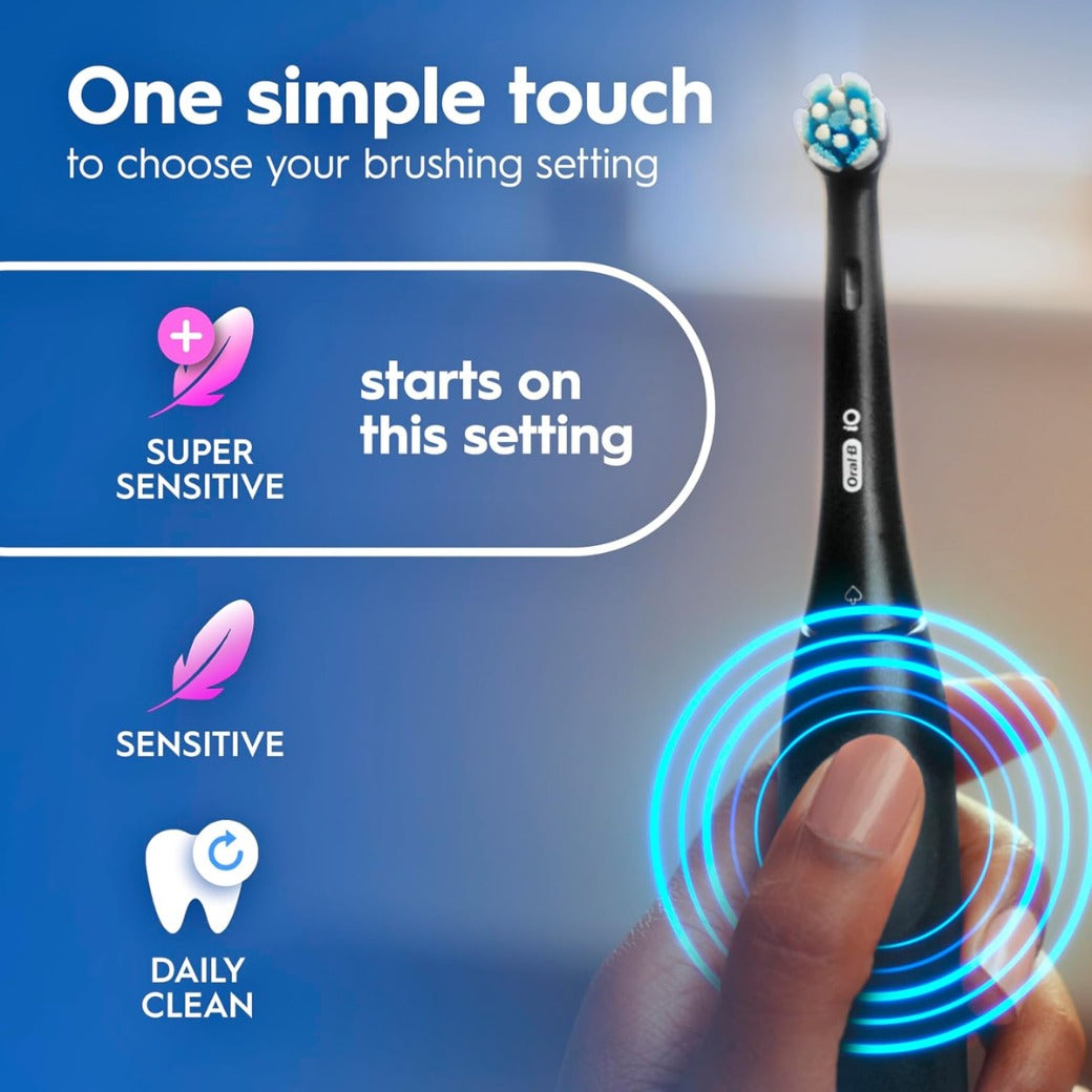 Oral-B iO2 Electric Toothbrush, 1 Gentle Care Toothbrush Head, 1 Travel Case, 1 Travel Refill Holder, Oral B Toothbrush Adults (Night Black), Designed by Braun, 2 Pin Plug