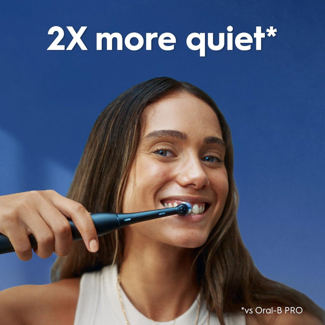 Oral-B iO2 Electric Toothbrush, 1 Gentle Care Toothbrush Head, 1 Travel Case, 1 Travel Refill Holder, Oral B Toothbrush Adults (Night Black), Designed by Braun, 2 Pin Plug